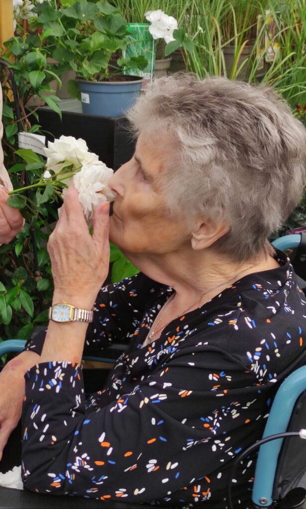Shirley stopping to smell the roses. 