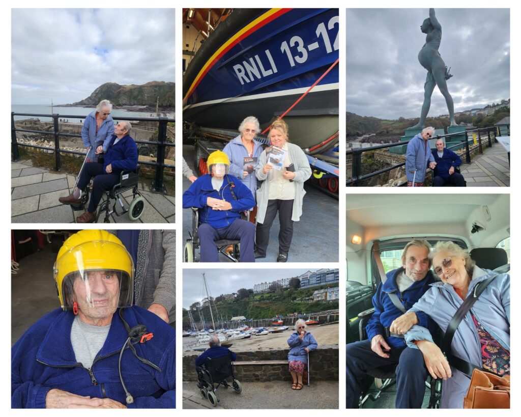 A collage showing an elderly man in a wheelchair enjoying a seaside visit with two women, featuring views of the harbor, boats, a lifeboat station, and a large statue.